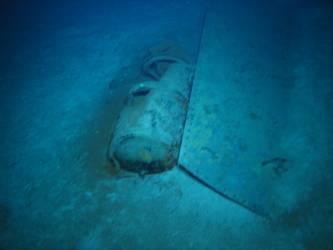 Steel plate and cylindrical tank on seabed. Top of B turret?